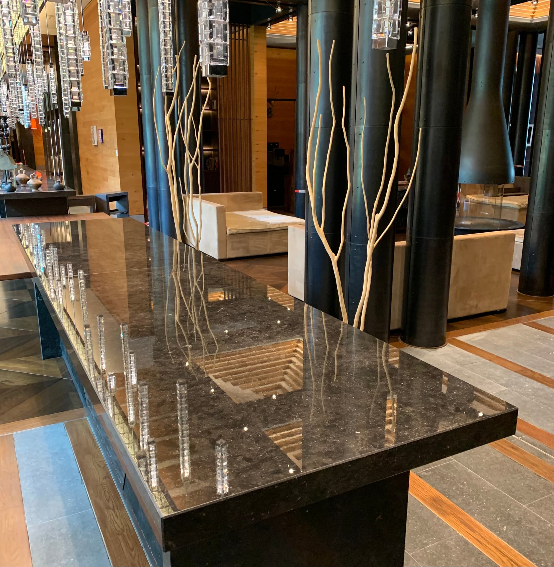 Protected black granite hotel reception counter