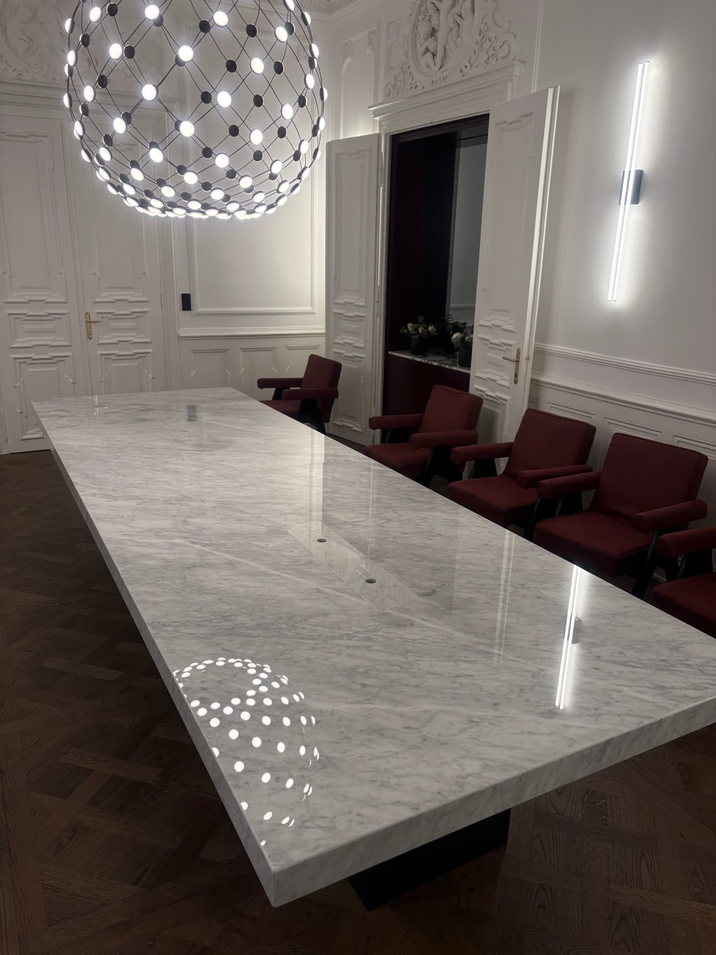Protected marble conference table with mirror finish