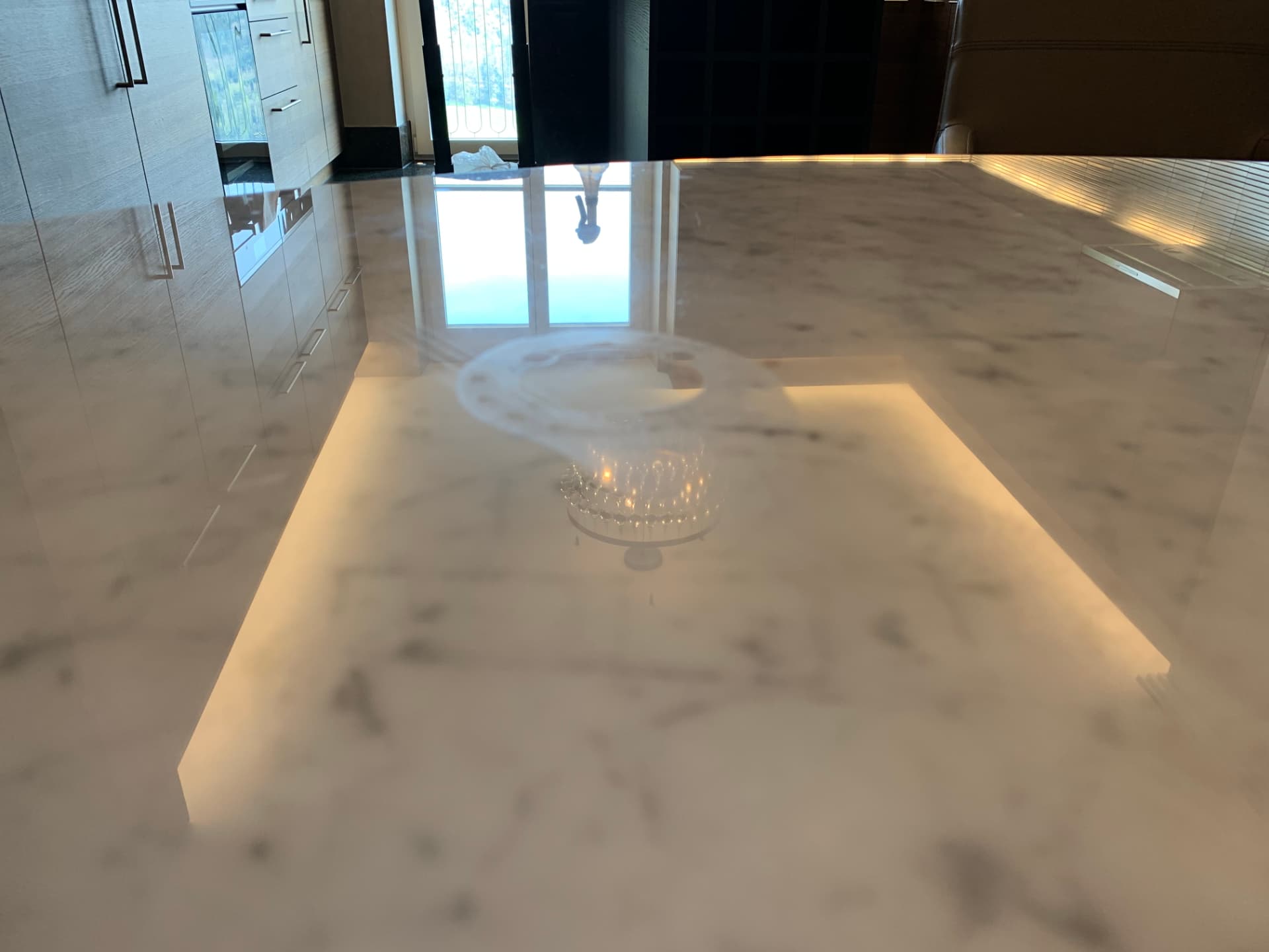 Backlit marble counter with invisible surface protection